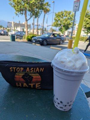 Taro smoothie with boba and whipped cream