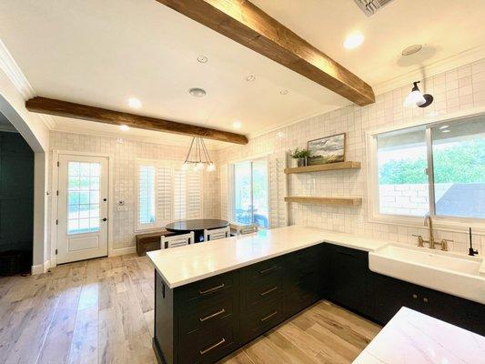 Kitchen cabinets from Shiloh Cabinetry in Polar and Iron Ore,  with Bayard Natural  woodlook tile and walls in beautiful Zelige!  Love!