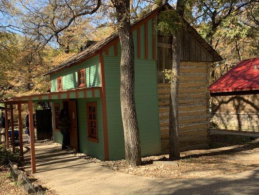 The Pickard house. Notice the back is still log cabin while the front was remodeled in milled lumber. From the 1860's