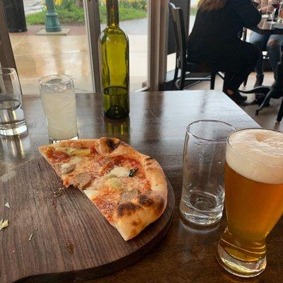 Great pizza and really good atmosphere. View from inside looking out towards town square.