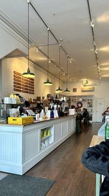 a very linear layout of the shop, from outside seating, serving counter to the back shelving area