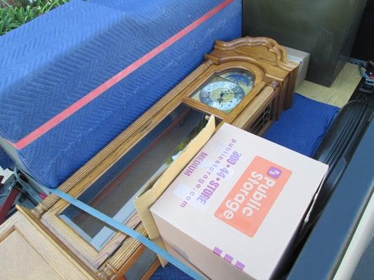 grandfather clock and file cabinets