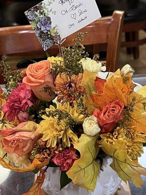 Autumn flowers in a pumpkin