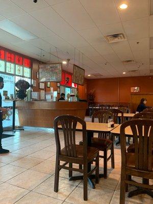 Hostess counter are partial view of large dining area