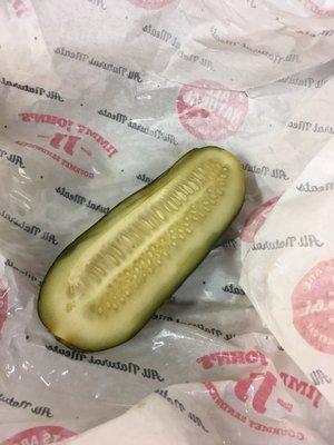 Whole pickle cut in half.