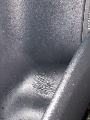 The interior already had defects. This is the driver side door pocket. They said I could "file a claim" after I bought the car.