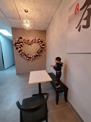 Seating area with the big heart on the wall