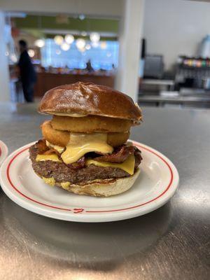 Beer cheese bacon pretzel burger