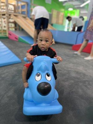 My baby enjoying one of the many fun toys at My Gym South Loop!