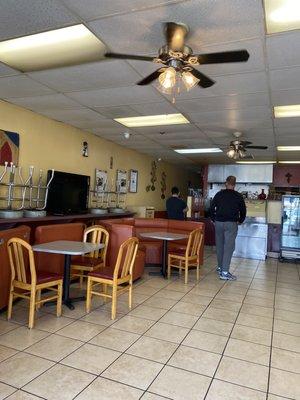 Austere interior with no more indoor dining