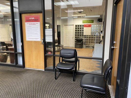 A maximum of 5 people is permitted in the vestibule at any time. All chairs are spaced out in our office to adhere to social distancing