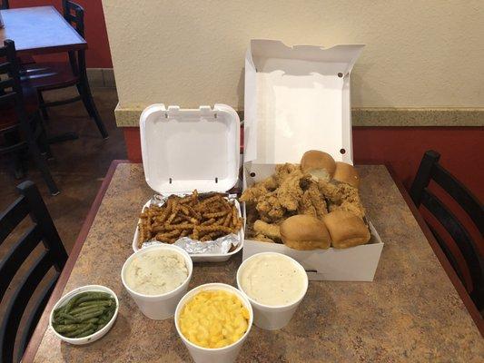 30 chicken tenders, 4 rolls, family mashed potatoes, family french fries, family mac and cheese, gravy, and regular side green beans