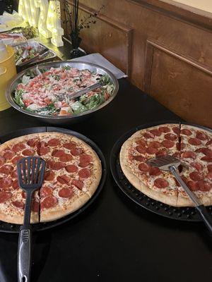 Pizza and Salad with homemade ranch and Italian provided by Total Sports