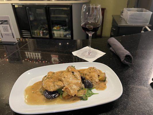 Chicken Medallions with roasted potatoes and sautéed vegetables in lemon butter sauce.