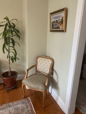 Refinished and reupholstered chair.