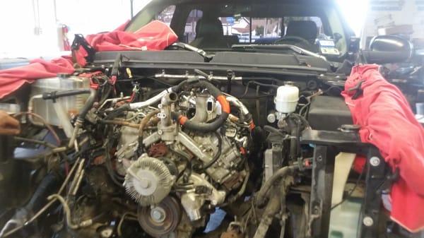 Hector repairing my 2011 Denali HD 6.6 Liter Duramax motor.