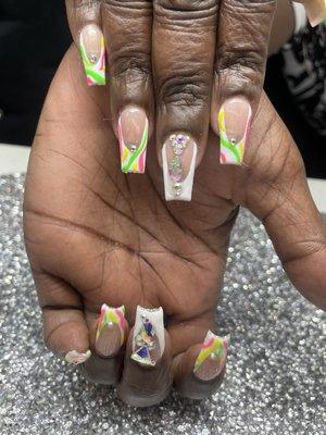 Gel - X nails with designs and bling