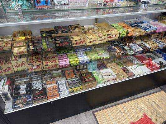 big selection of rolling papers and rollers