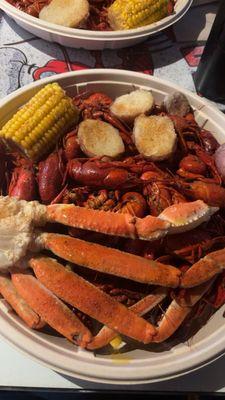 3lb tray of Crawfish with potatoes and corn and a crab cluster