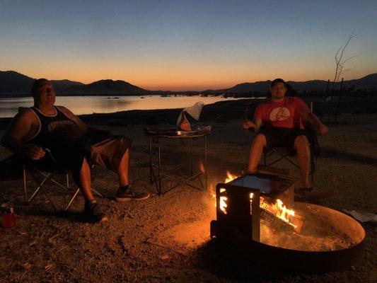 My  boyfriend and his father relaxing by the fire