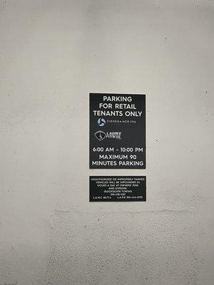 Parking signs show lagree fitness