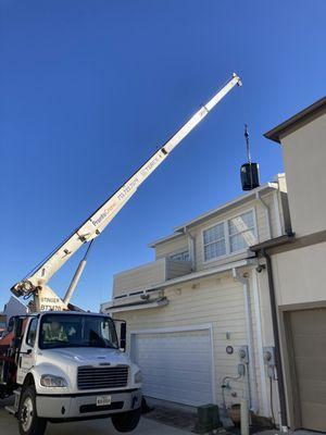 We needed a crane to place a new compressor on the roof.