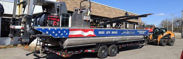 Our elite barge capable of lifting boat lifts up to 10k capacity