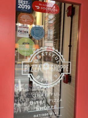 Grateful Bites pizza shop front door