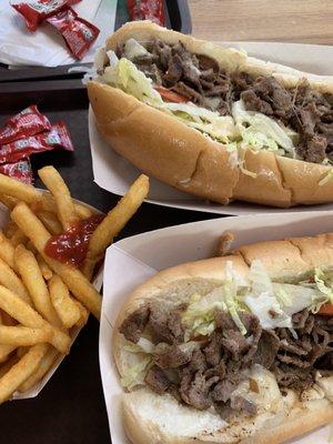 Two small steak hoagies and French fries