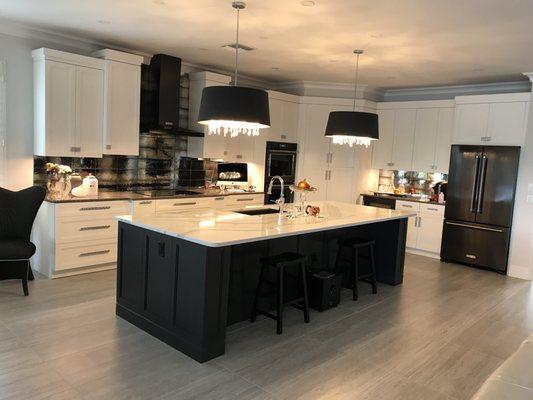 Custom kitchen cabinets ,countertop , backsplash and handles !