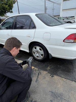 Kyle checking my tires.