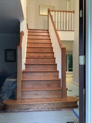 New refinished steps, posts, stairs, and railing.