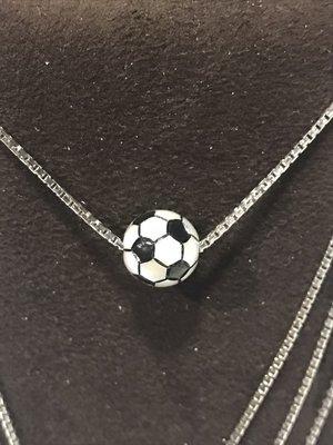 Fresh water pearl as a soccer ball on silver chain.