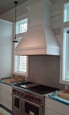 Vent hood and tile backsplash