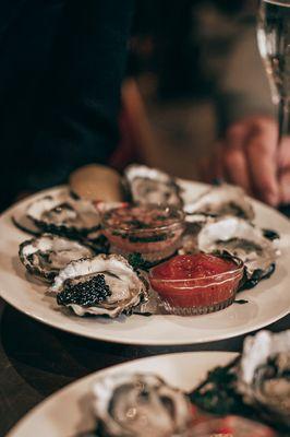 Raw Oysters on the Half Shell. Oyster Happy Hour every Monday - Wednesday.