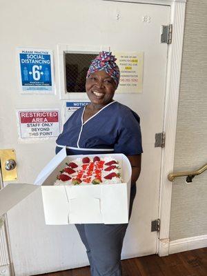 The cake was given to her by the resident's family thanking her for taking care of their family at CV Westwood