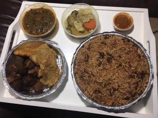 Clockwise from top left: legume (mashed vegetables), mixed vegetables, red sauce, rice and beans, griot with green and sweet plantains.