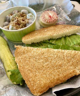 Chicken salad sandwich and grape salad