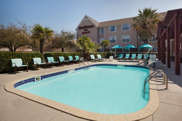 Spend the afternoon relaxing in the sun by the heated outdoor pool.