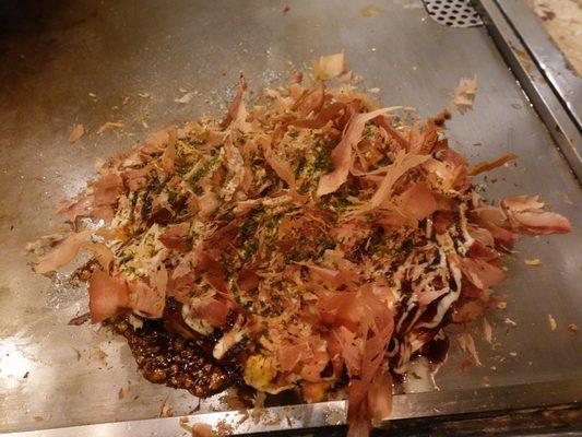 Okonomiyaki on the teppanyaki grill. June 2024.