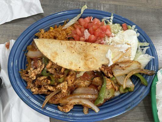 Lunch fajita quesadilla, the filling is pulled out because my mom was eating it like a salad.