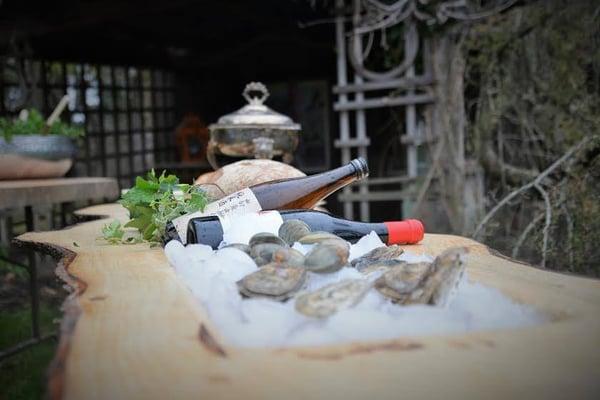 Custom made oyster table complete with hollowed out center for keeping your bivalves chilled