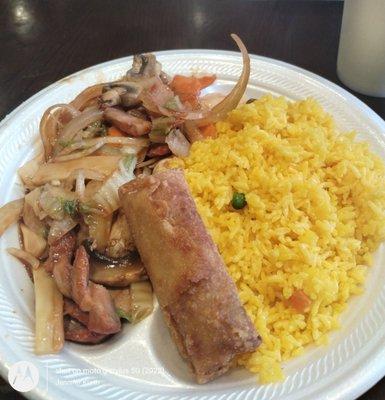 Roasted pork with vegetables fried rice and an egg roll