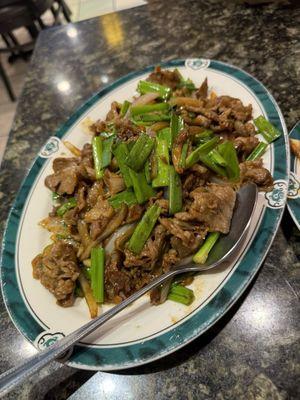 Lamb with green onions