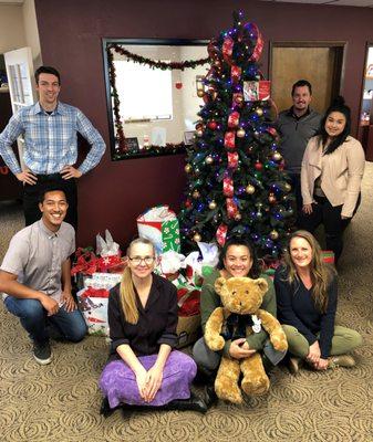 Santa's elves helping with Boys and Girls Club Adopt a Family Program