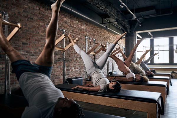 Group Pilates Class on the reformer