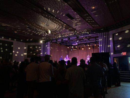 Nikki Lane belting it out with the disco ball setting the mood