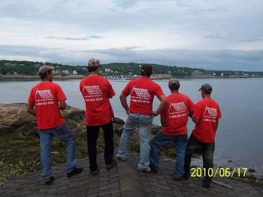 The PRS crew takes a minute to appreciate the beauty of Cape Ann from their unique viewpoint from the ridge of a waterfront p...