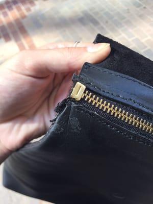 The store got glue on the leather and didn't properly sew in the new zipper (which they replaced without my permission)