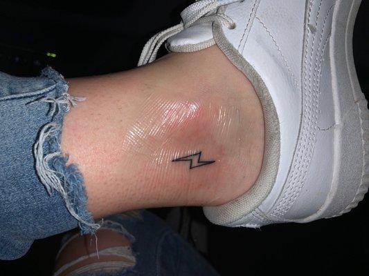 Lightning bolt outline on inner ankle